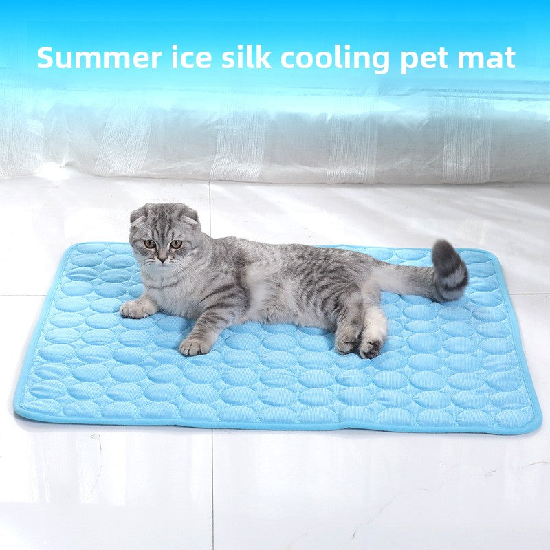 Cat lying on a blue summer ice silk cooling pet mat with text above.