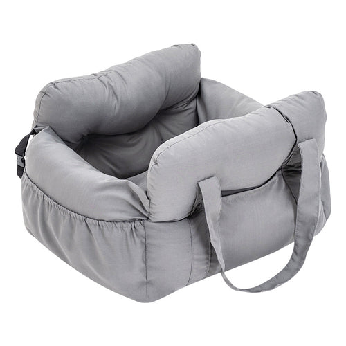 A grey dog's seat with headrest on a white background