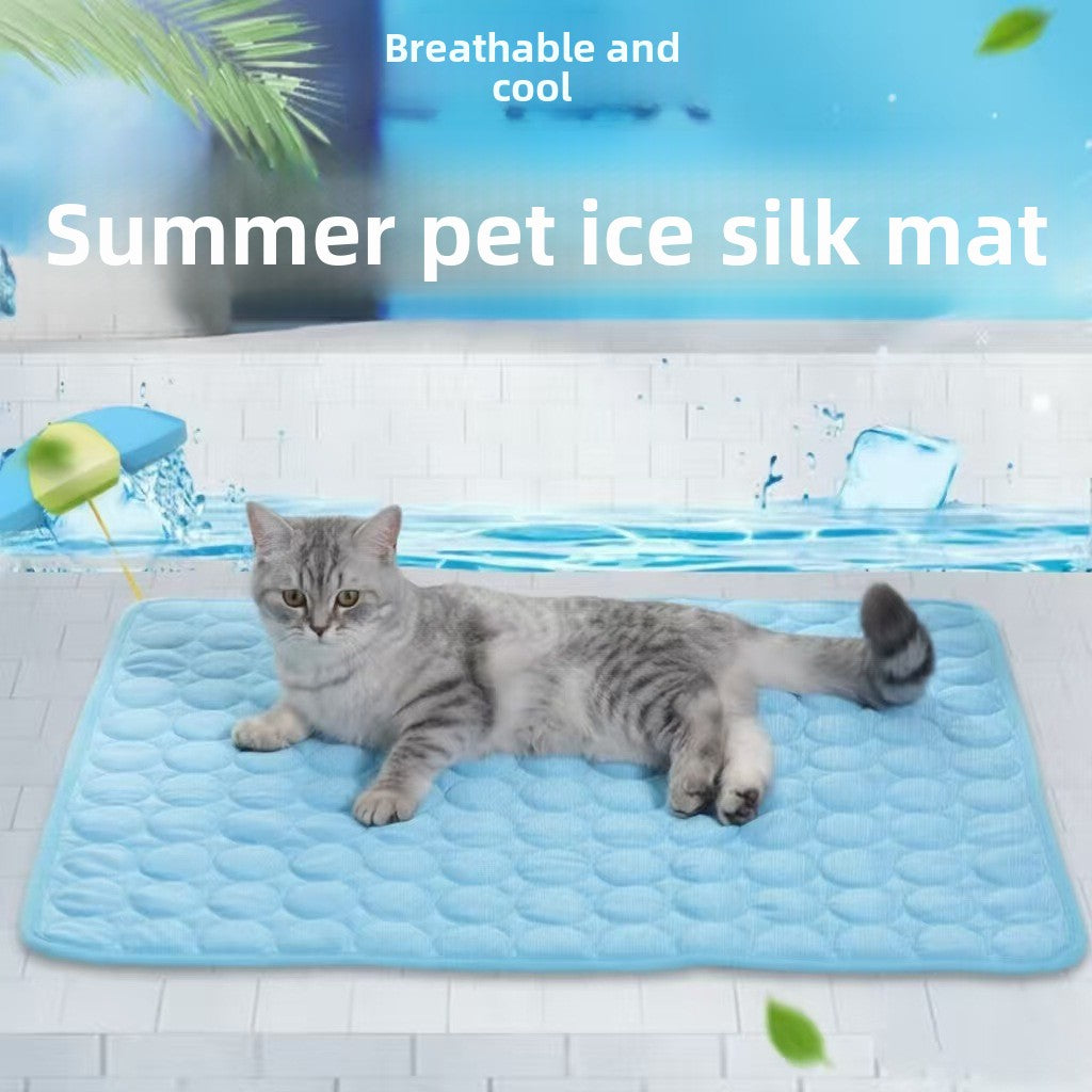 A gray tabby cat lies on a light blue quilted cooling mat in a tiled poolside setting, with overlaid text reading 'Breathable and cool' and 'Summer pet ice silk mat.' The product being shown is the pet cooling mat, not the cat or the pool scene.