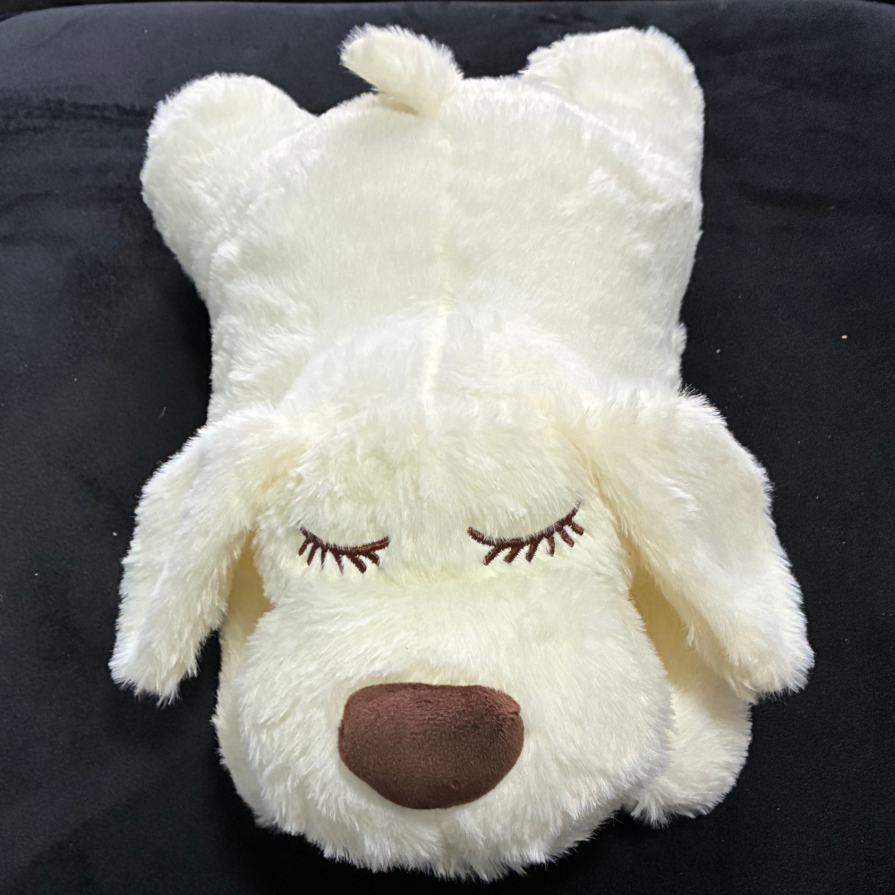 White plush dog heartbeat toy with embroidered sleeping eyes and brown nose